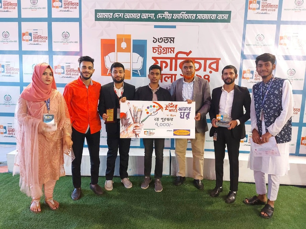 The Heaven Furniture Mart team with prize winners of the Tulir Achore Amar Ghor art competition