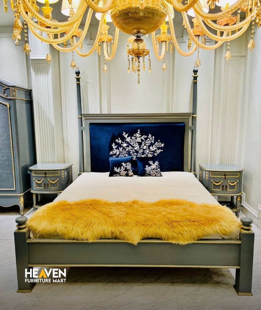 Royal navy velvet four-poster bed with embroidered headboard and gold accents by Heaven Furniture Mart